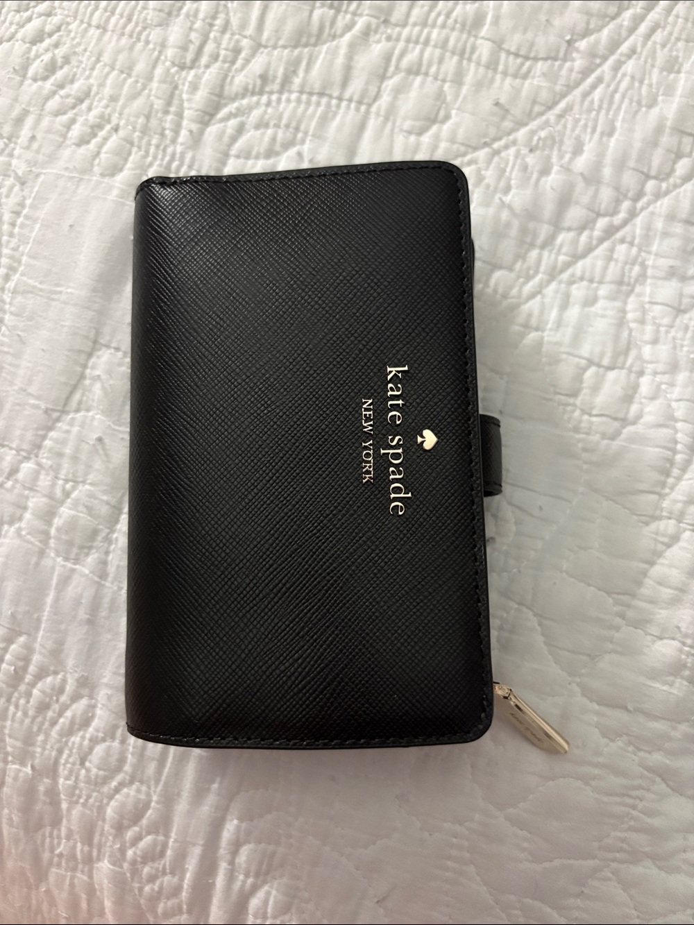 kate spade black saffiano leather zip-around wallet with gold logo